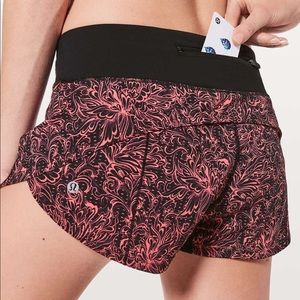 Lululemon speed shorts! Black with pink design